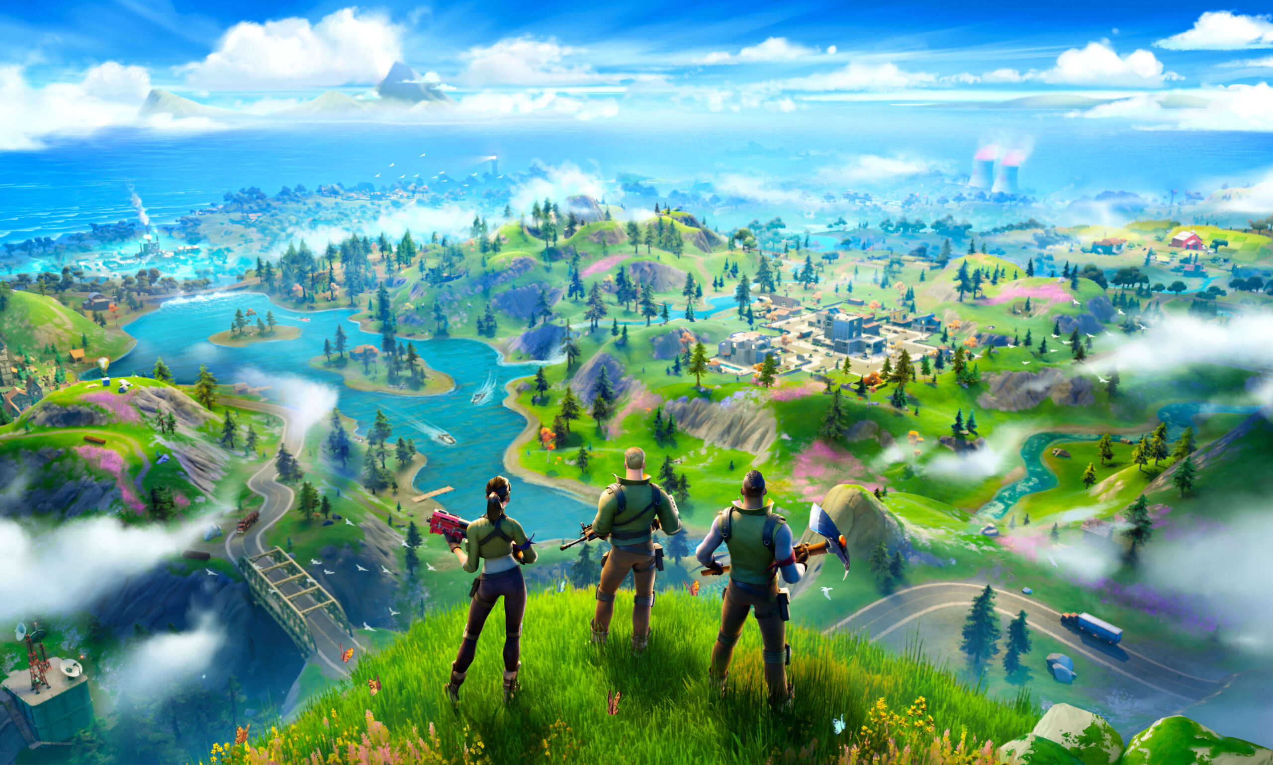 Three Fortnite Characters standing on a cliff overlooking the gameplay map